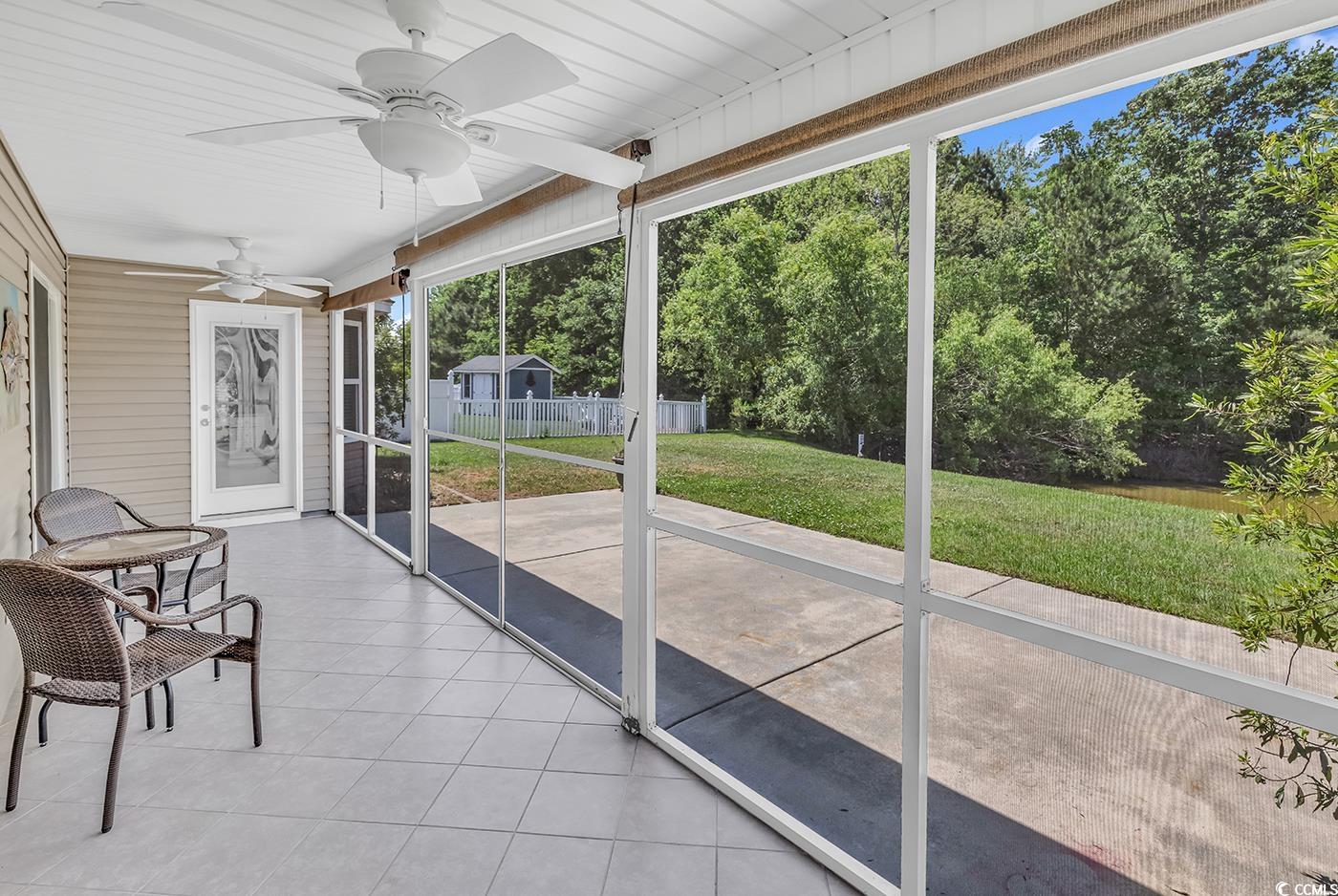 389 Barton Loop Myrtle Beach, SC 29579 - Photo 30 of 40 Sunroom / solarium with ceiling fan and a healthy