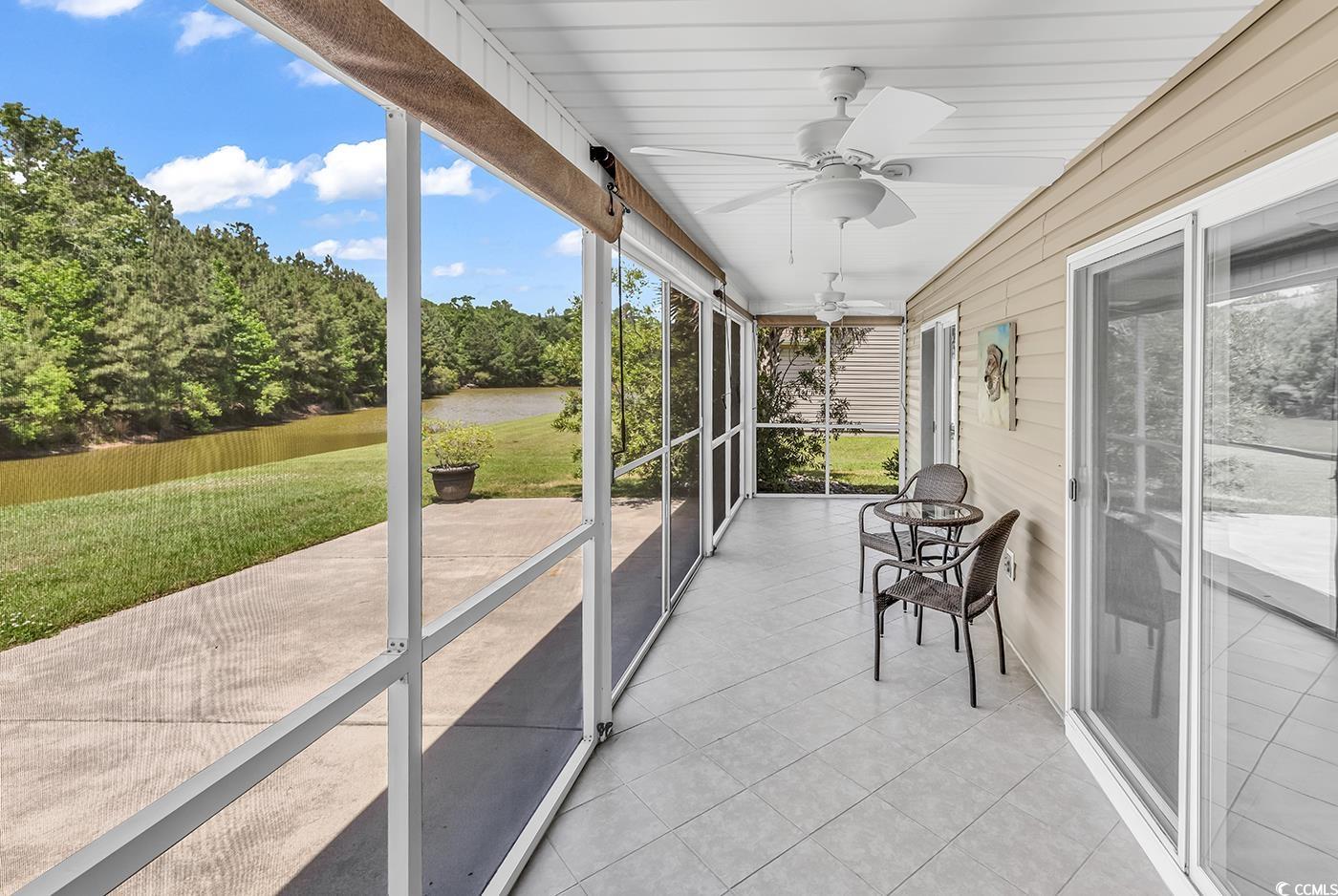 389 Barton Loop Myrtle Beach, SC 29579 - Photo 39 of 40 Sunroom / solarium with a ceiling fan and a water