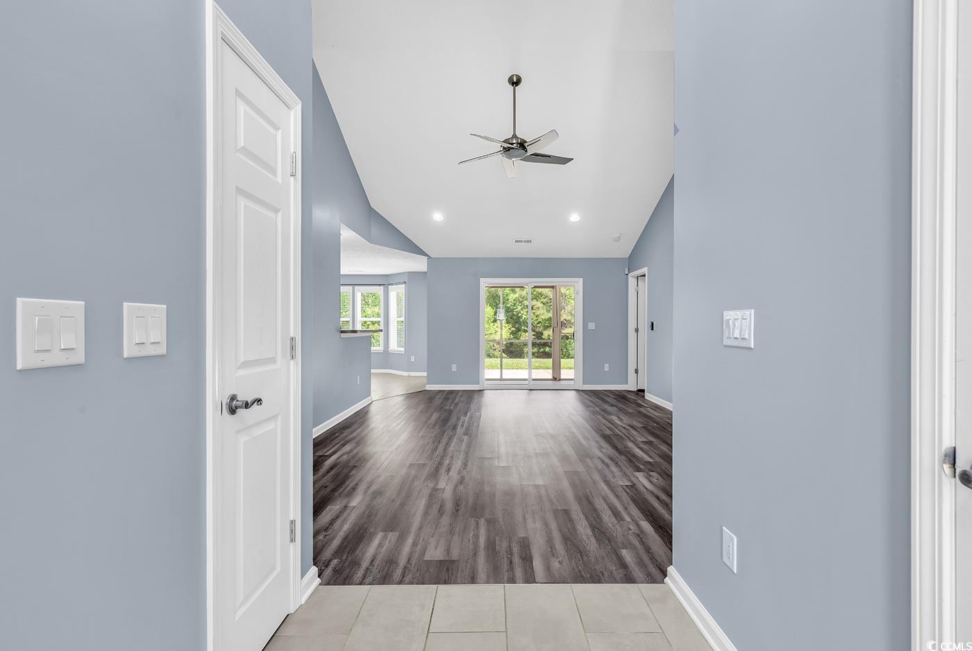 389 Barton Loop Myrtle Beach, SC 29579 - Photo 5 of 40 Hall with baseboards, recessed lighting, wood fini