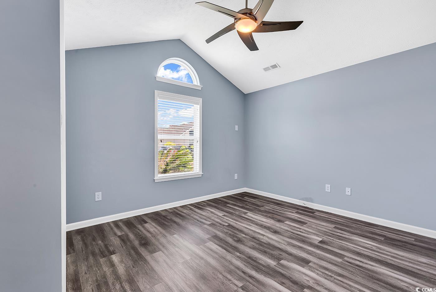 389 Barton Loop Myrtle Beach, SC 29579 - Photo 7 of 40 Unfurnished room with visible vents, a ceiling fan