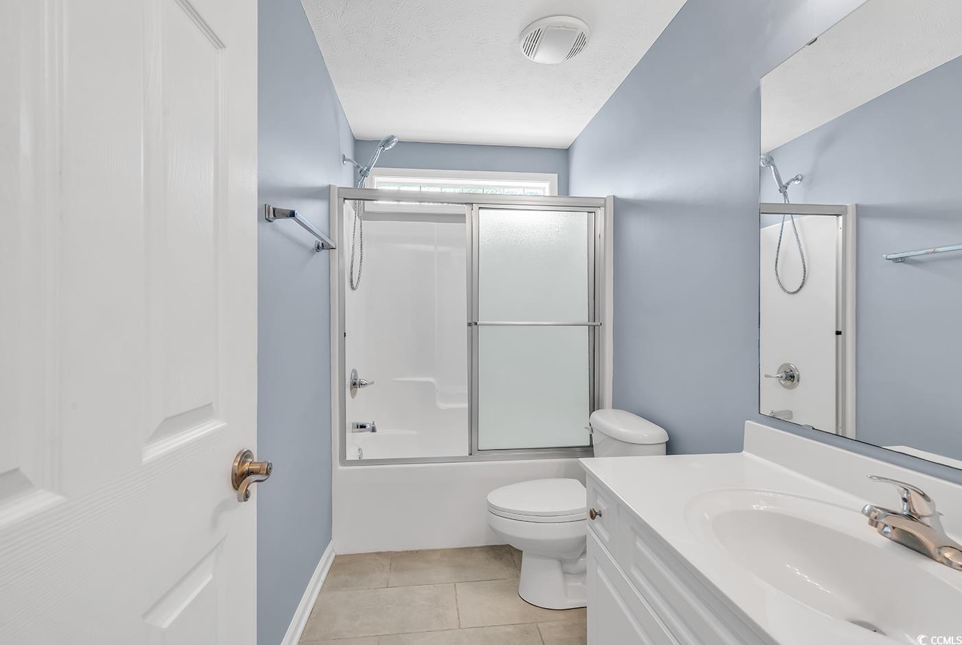 389 Barton Loop Myrtle Beach, SC 29579 - Photo 9 of 40 Bathroom featuring tile patterned flooring, combin