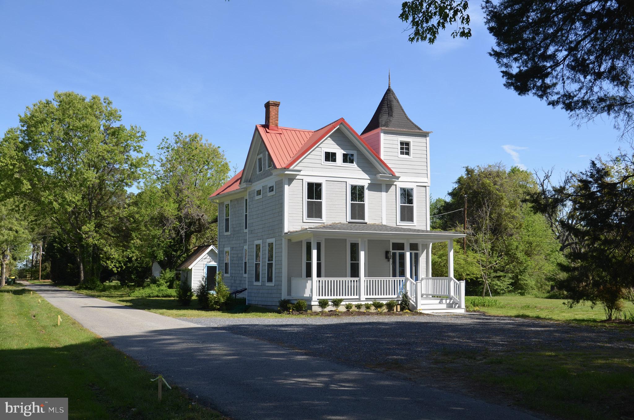 8013 Ruby Harrison Road St. Michaels, MD 21663 - Photo 39 of 47 a front view of a house with a yard