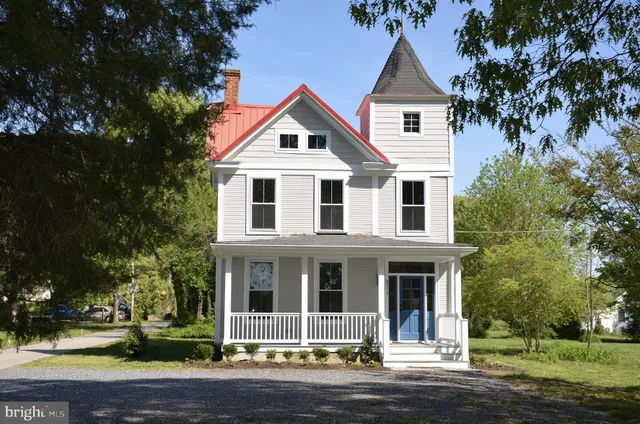 a view of a lake with a yard