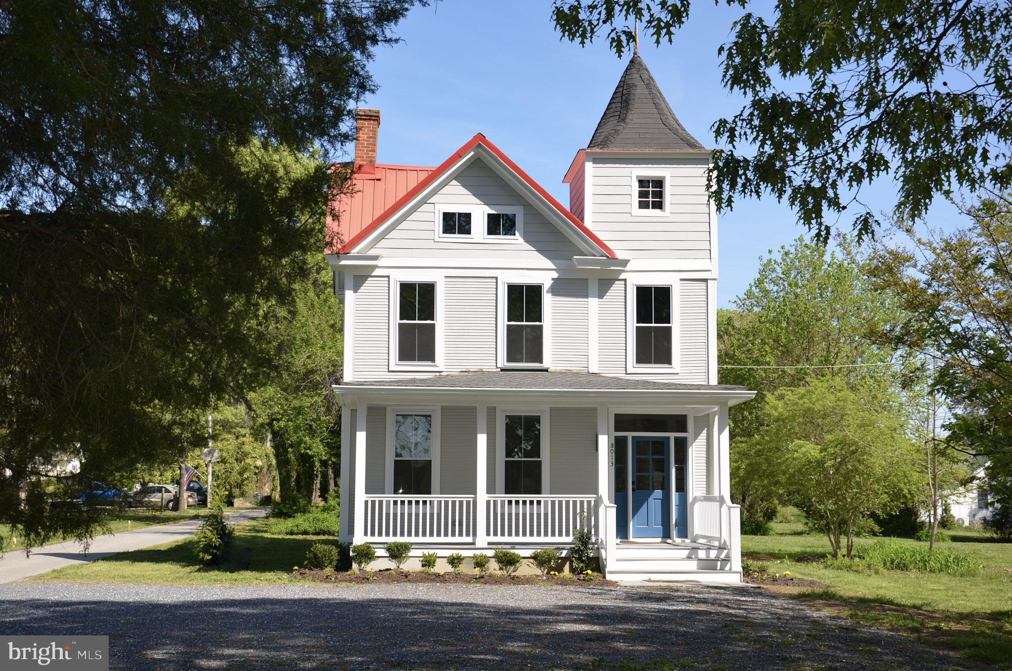 8013 Ruby Harrison Road St. Michaels, MD 21663 - Photo 45 of 47 a front view of a house with a yard