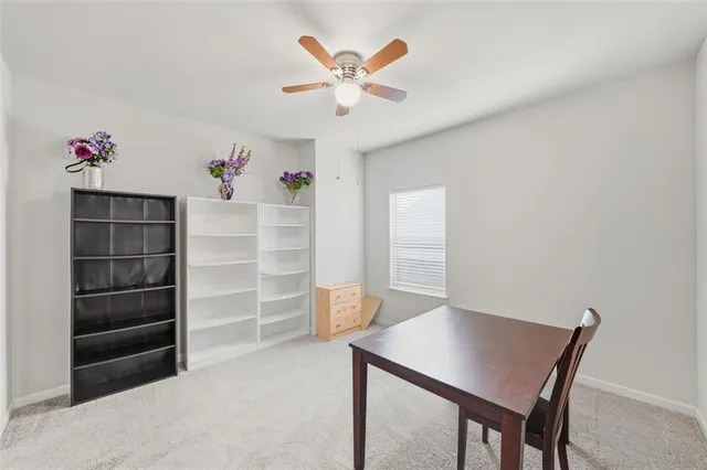a kitchen with stainless steel appliances a refrigerator sink and cabinets