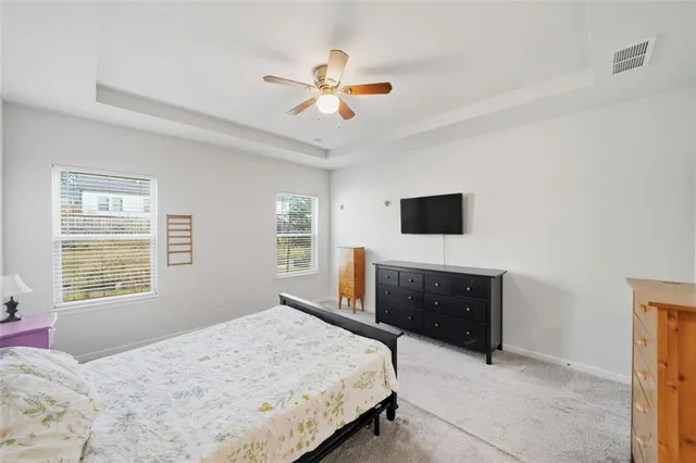 a bathroom with a double vanity sink mirror and