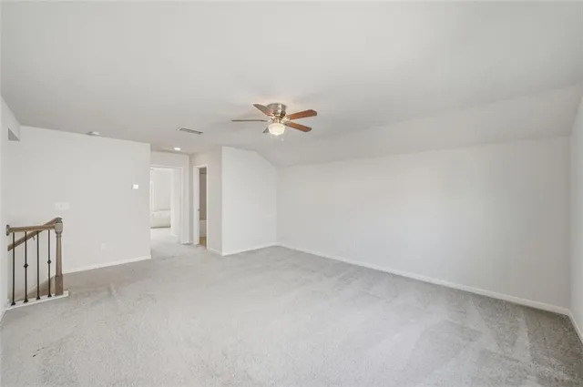 a bathroom with a sink a toilet a mirror a bathtub and shower