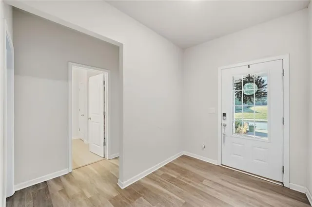 a swimming pool with outdoor seating yard and barbeque oven