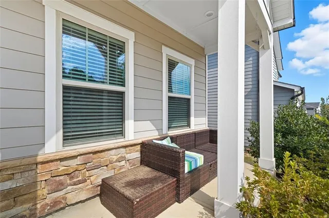 a view of house with a outdoor seating
