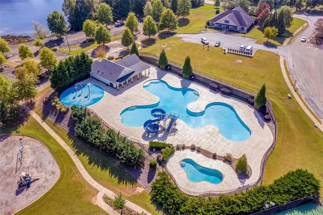 a view of a swimming pool with a sitting space
