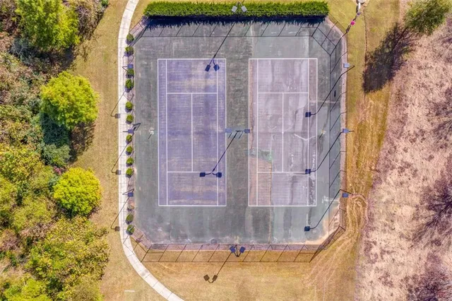 an aerial view of a houses with outdoor space