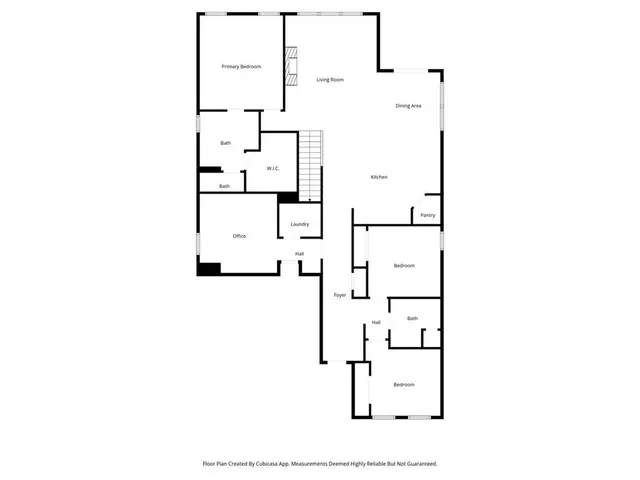 a picture of floor with a white wall and a painting