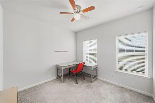 a room with furniture and a window