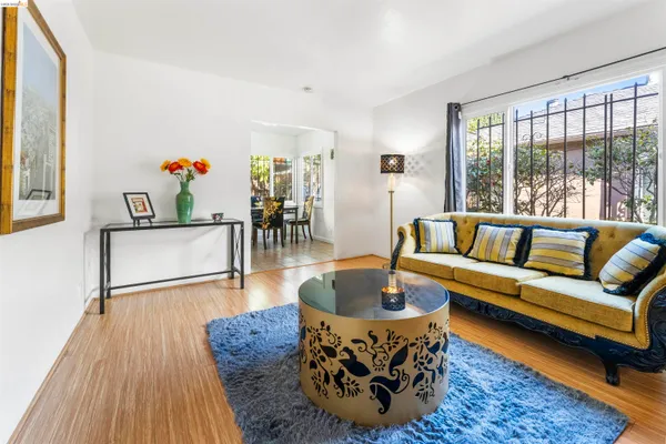 a living room with furniture and a table
