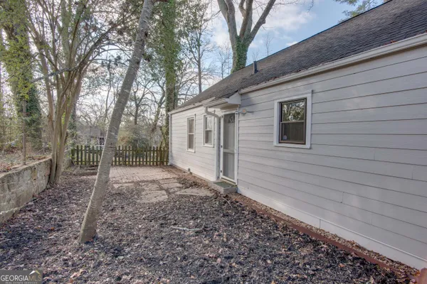 a backyard of a house with lots of green space