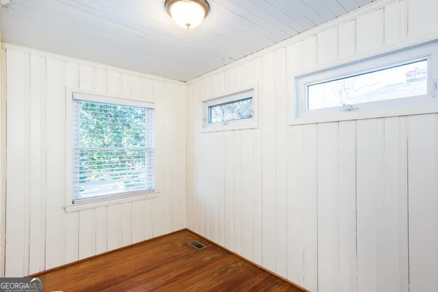 a view of a room that has a window in it