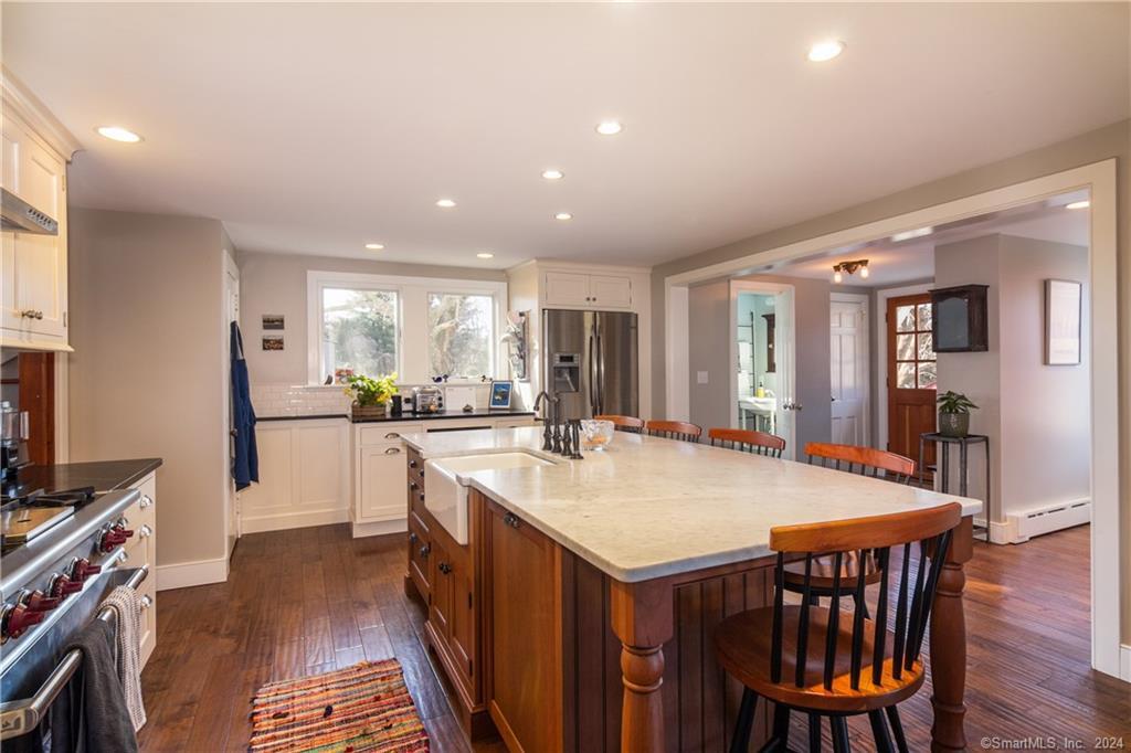323 Green Hill Road Madison, CT 06443 - Photo 5 of 18 Kitchen offers stainless appliances and farm sink.