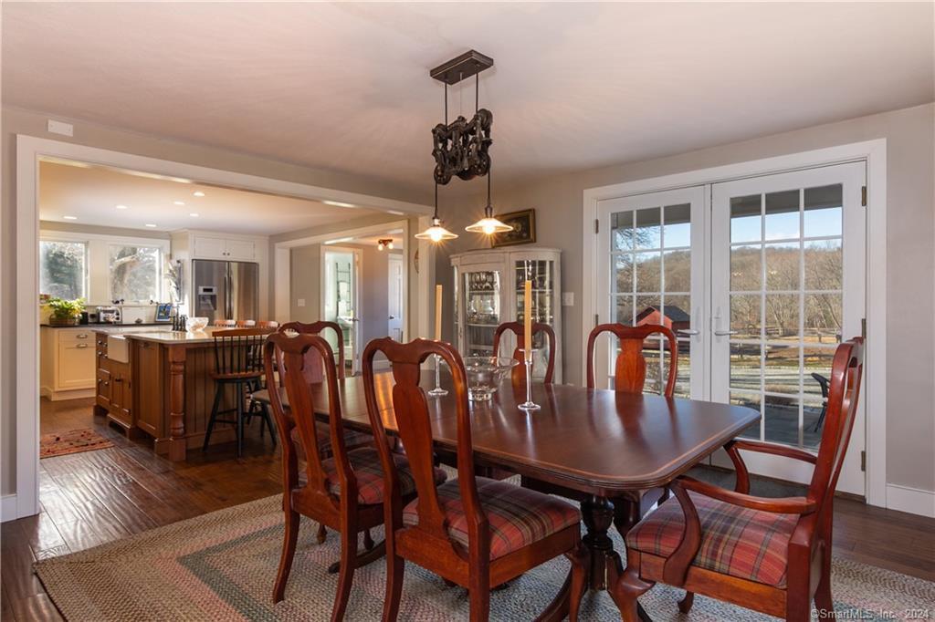 323 Green Hill Road Madison, CT 06443 - Photo 8 of 18 French doors allow in tons of natural light.