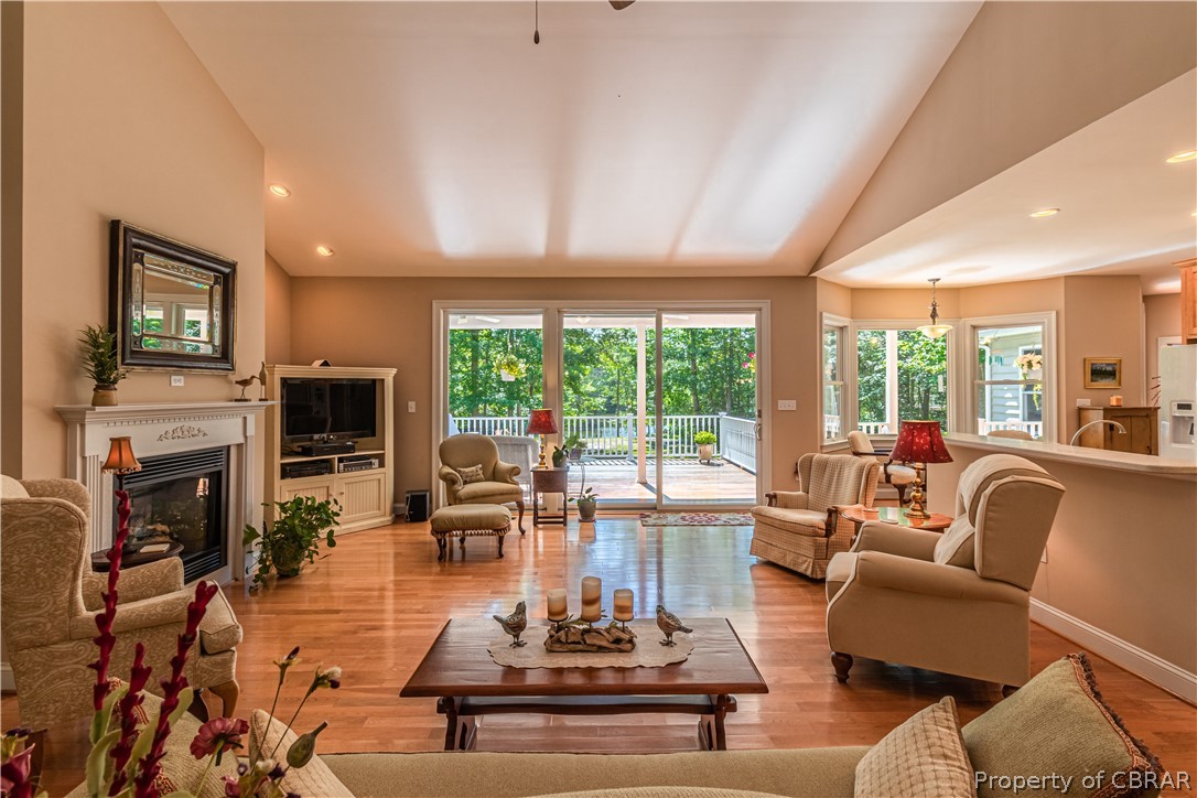 471 Woodbrook Road Lancaster, VA 22503 - Photo 11 of 47 Great Room opens to Waterside Deck.