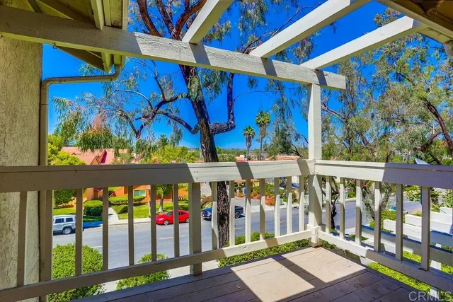 a view of a small park from a balcony