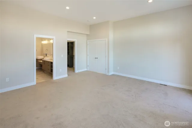 a view of a big room with closet and natural light