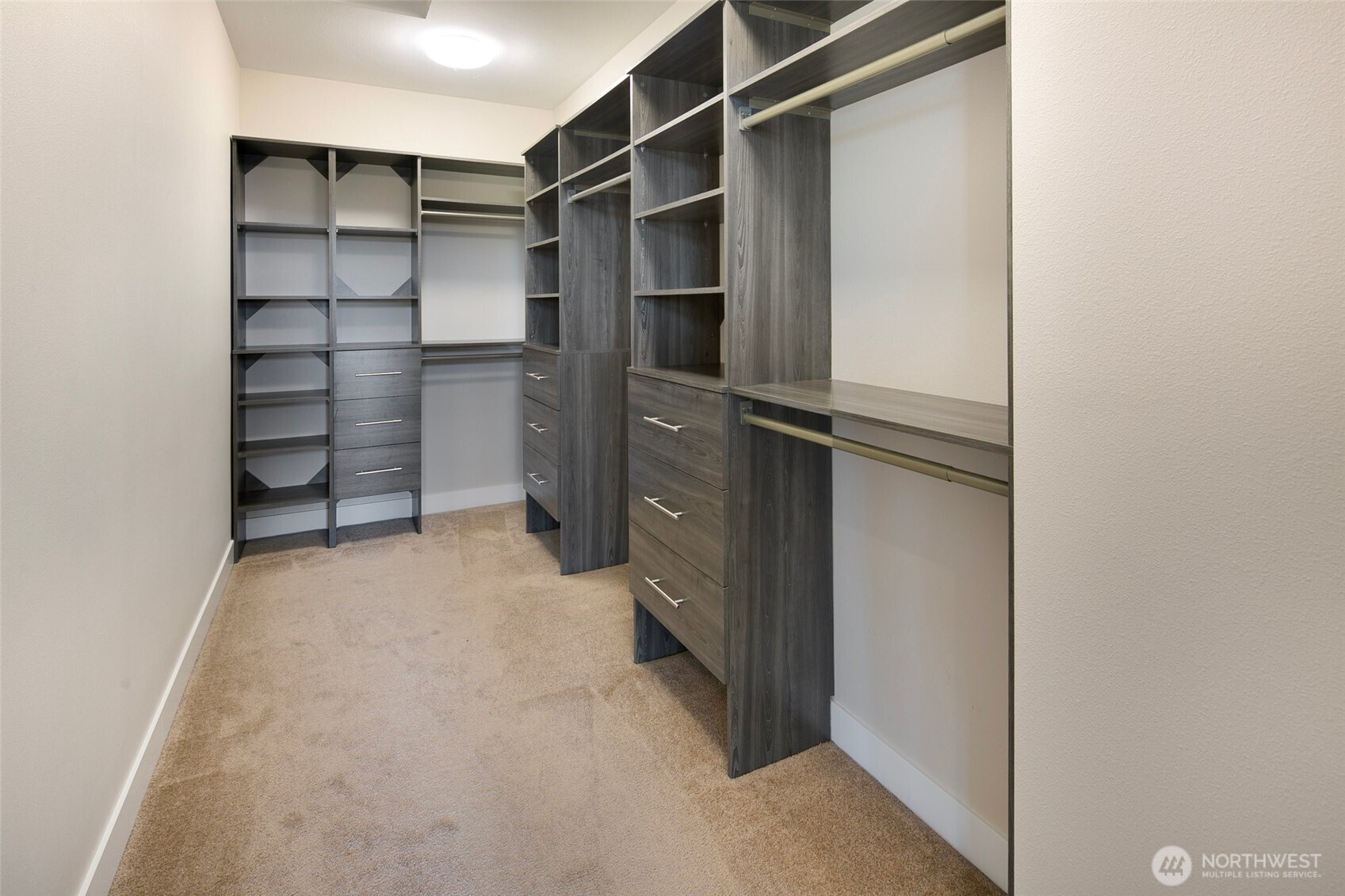 11838 79th Avenue South Seattle, WA 98178 - Photo 20 of 38 a view of walk in closet with empty racks