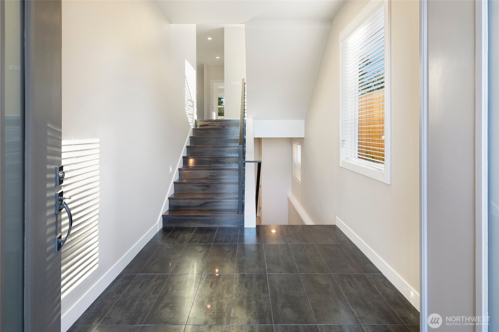 11838 79th Avenue South Seattle, WA 98178 - Photo 2 of 38 a view of entryway and hall with wooden floor