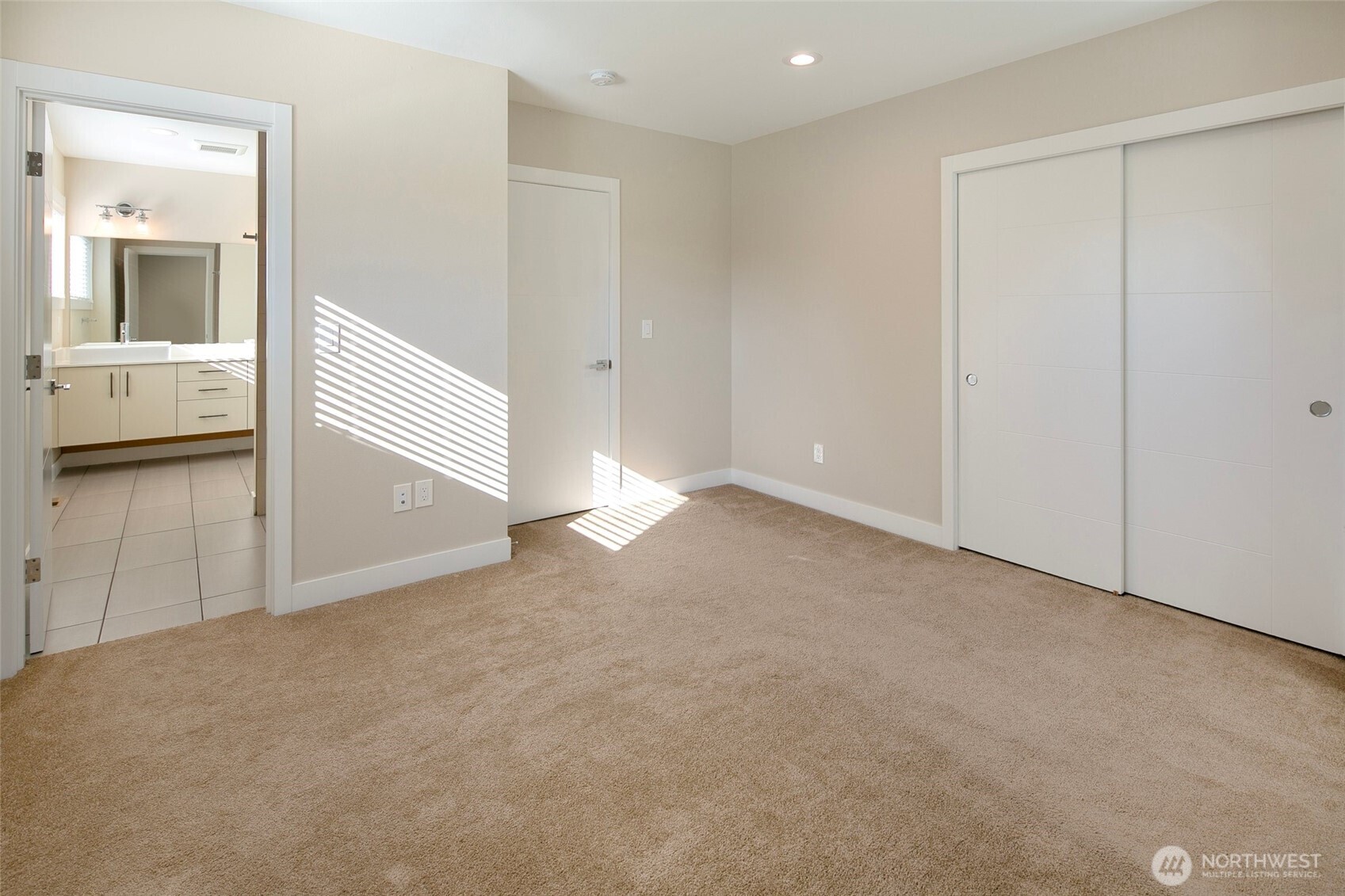 11838 79th Avenue South Seattle, WA 98178 - Photo 22 of 38 an empty room with a empty space and windows