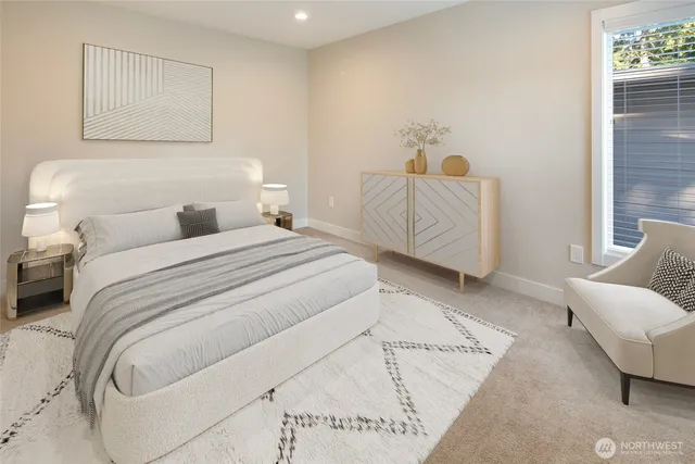 a bedroom with a bed and a couch