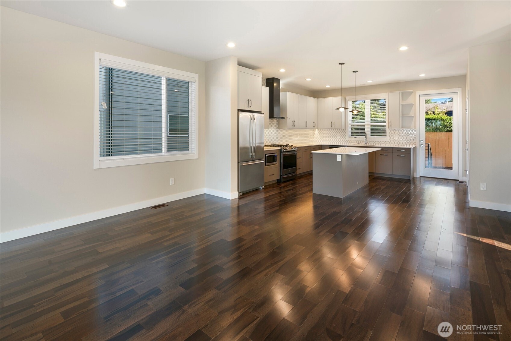 11838 79th Avenue South Seattle, WA 98178 - Photo 7 of 38 a large kitchen with lots of counter space and stainless steel appliances