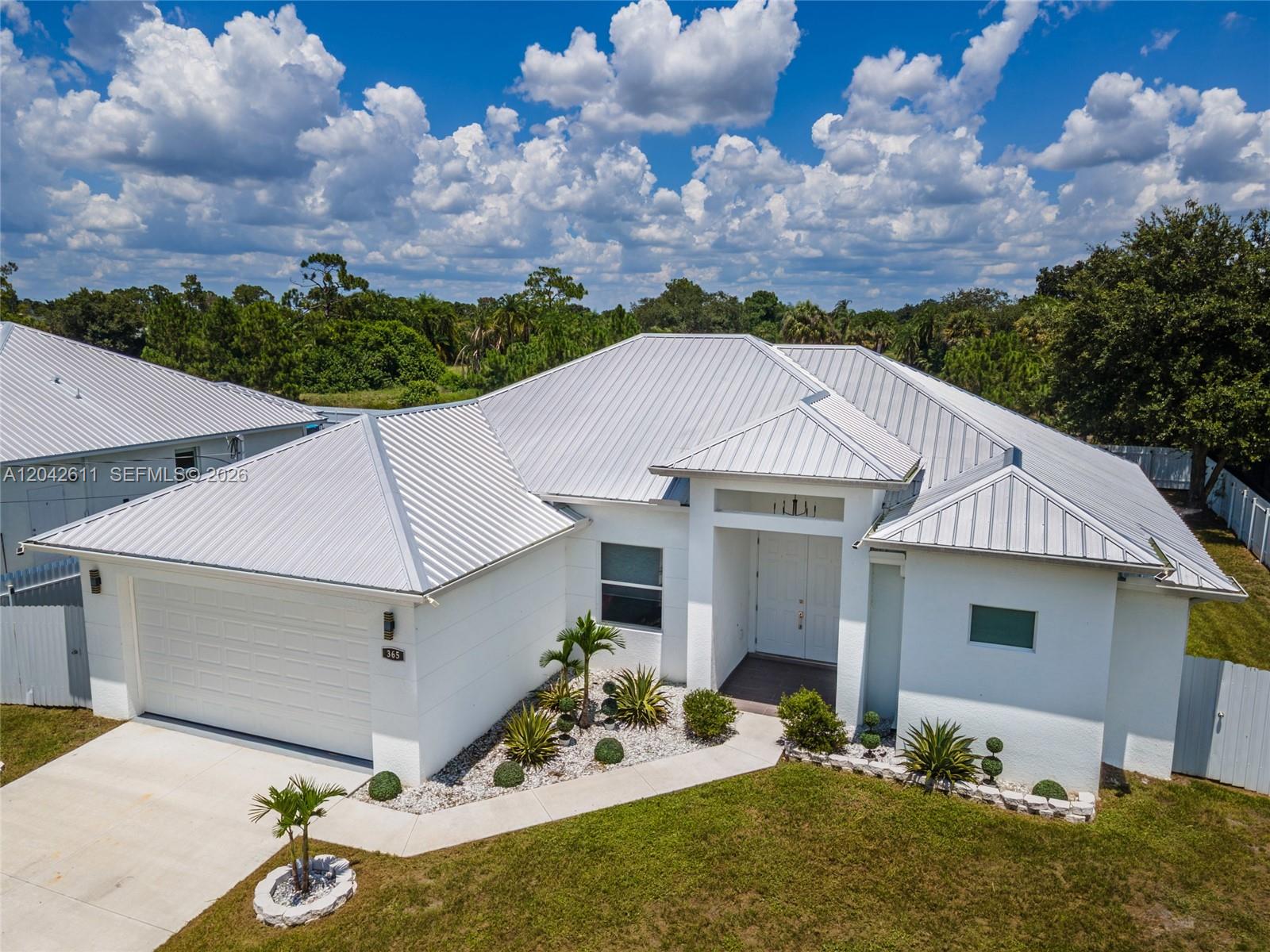 365 Ranier Avenue Lehigh Acres, FL 33974 - Photo 5 of 50