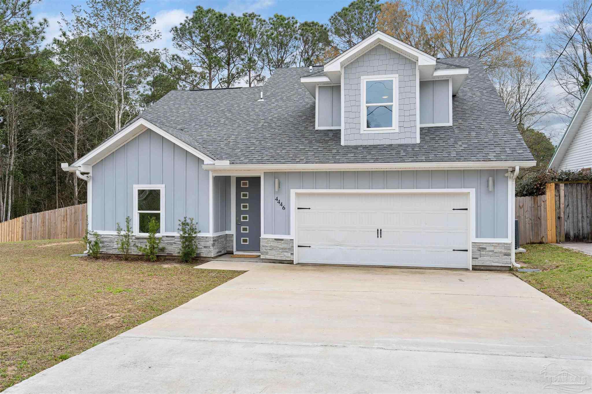 4446 Antioch Road Crestview, FL 32536 - Photo 1 of 43 a view of a house with a yard and large tree
