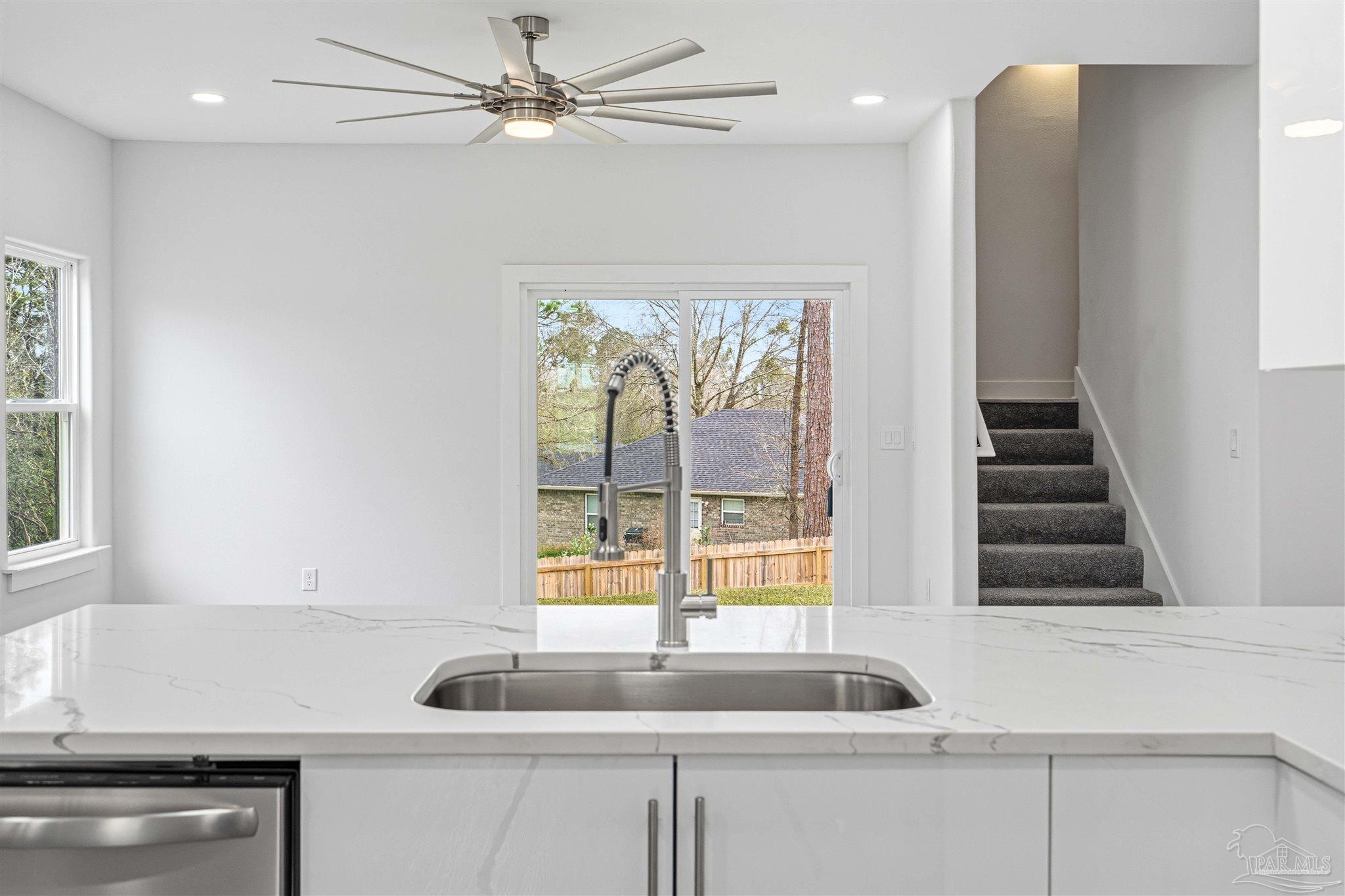 4446 Antioch Road Crestview, FL 32536 - Photo 13 of 43 a kitchen with a sink and a window