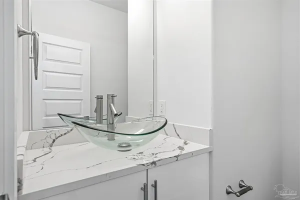 a close view of dining table with chairs