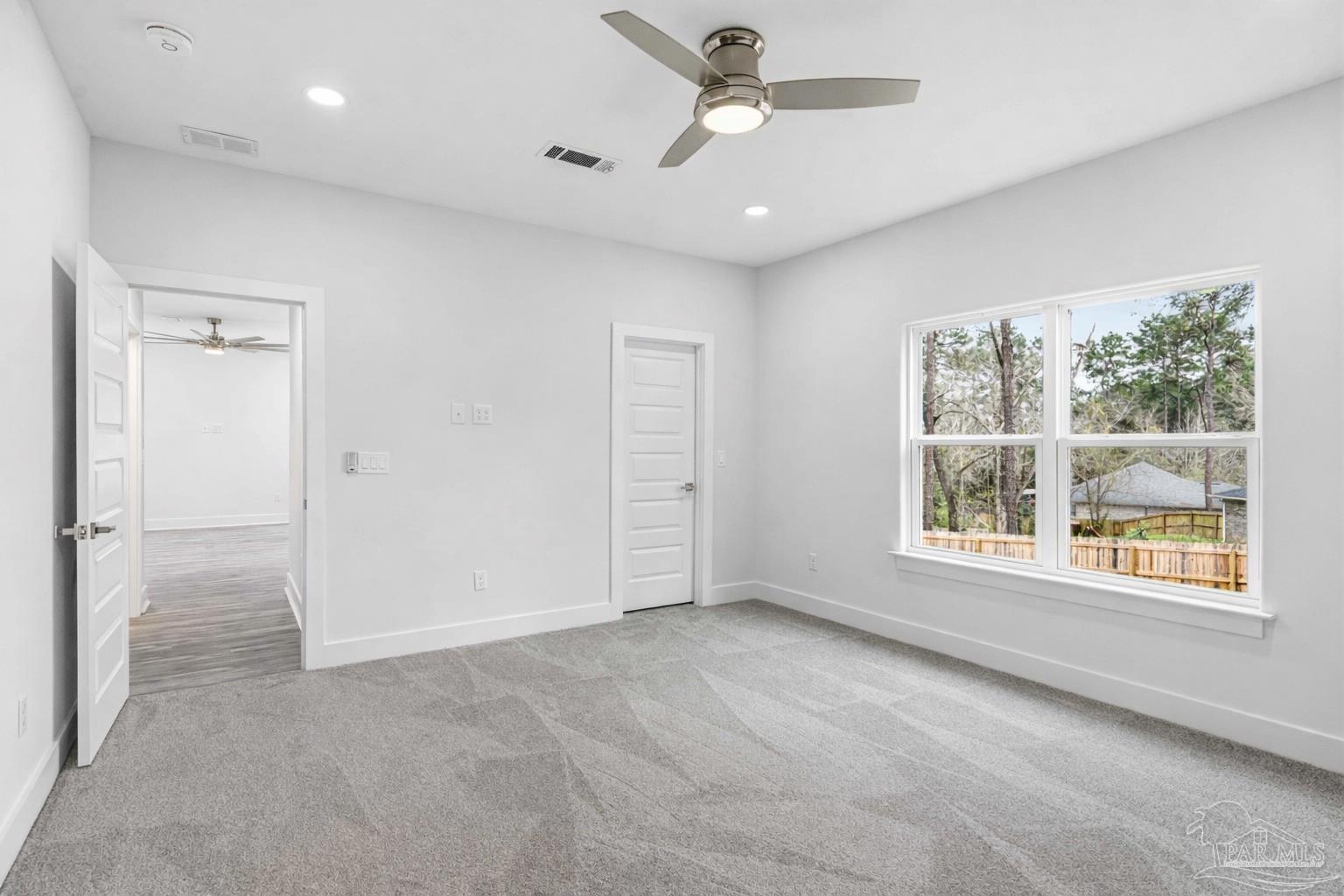 4446 Antioch Road Crestview, FL 32536 - Photo 17 of 43 a view of an empty room with a window