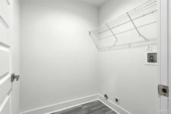 a view of a room with racks on the wall