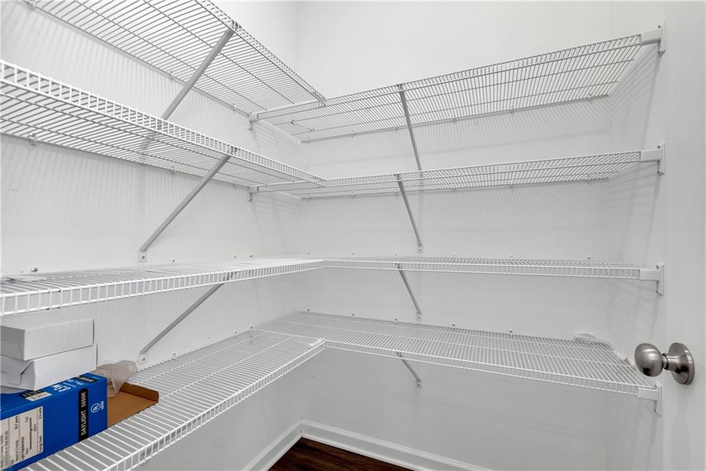 489 Asbury Mill Road Cleveland, GA 30528 - Photo 26 of 34 a view of a room with racks on the wall