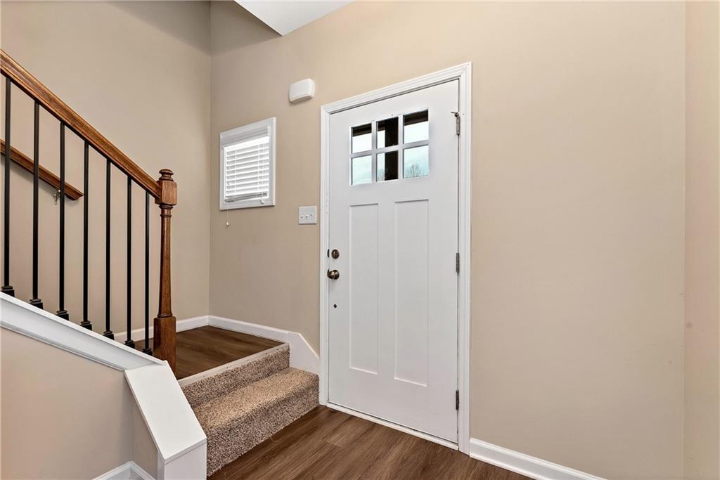 489 Asbury Mill Road Cleveland, GA 30528 - Photo 5 of 34 a bedroom with a bed and a window