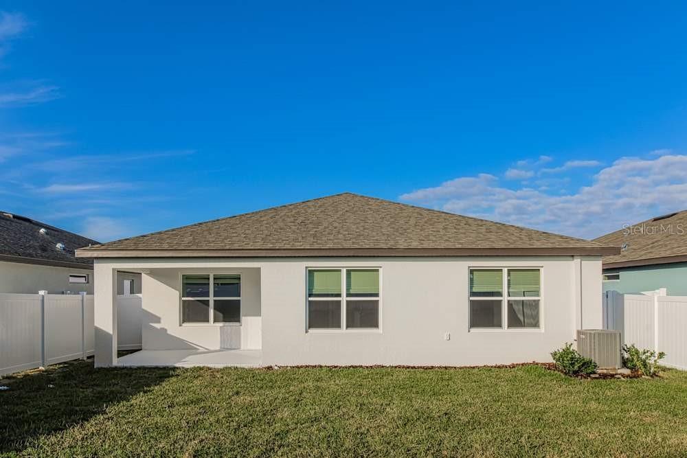 3650 Benham Rise Road Spring Hill, FL 34609 - Photo 7 of 7 front view of house with a yard