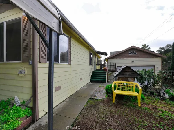 a house view with a backyard space