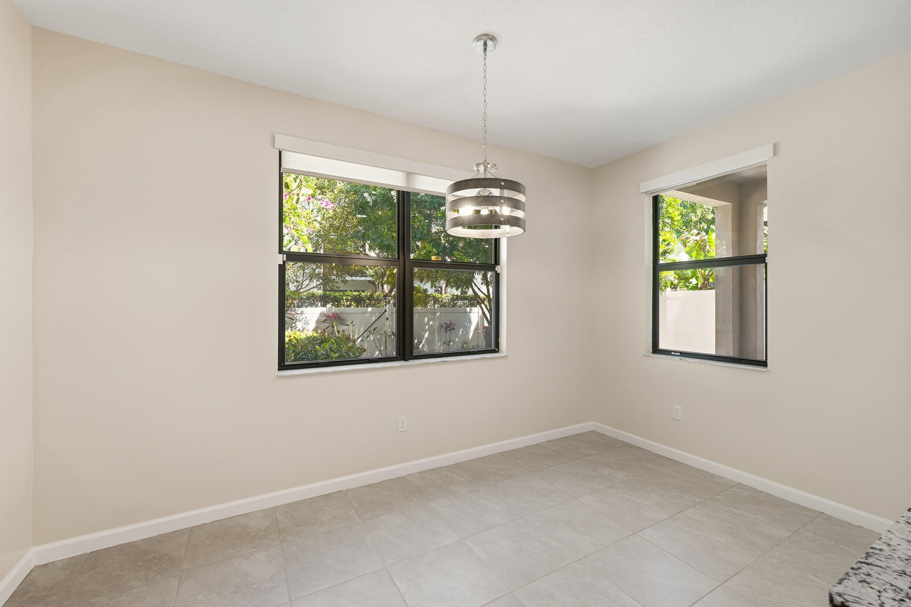 340 Northwest 33rd Lane Pompano Beach, FL 33069 - Photo 13 of 47 a view of an empty room with windows