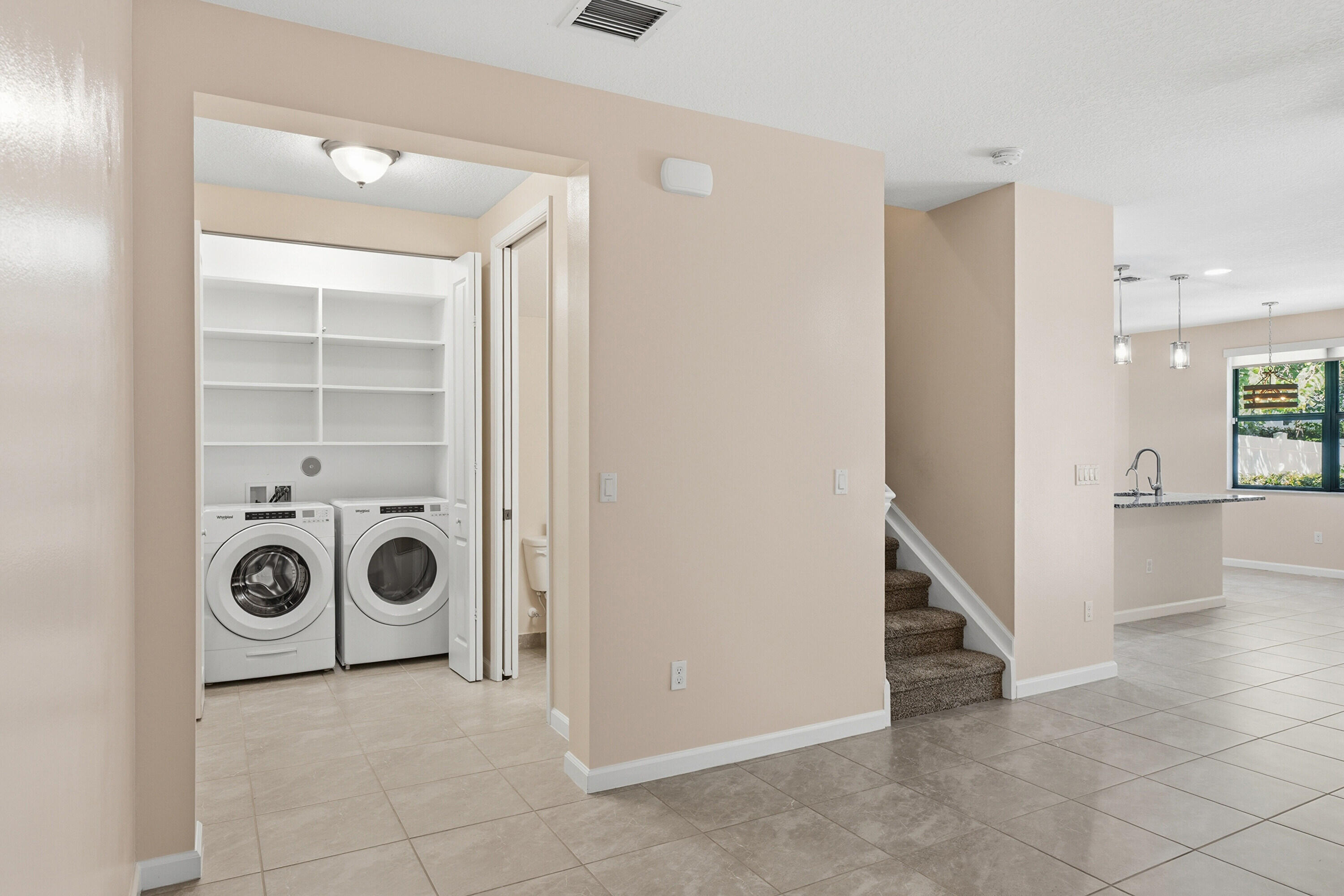 340 Northwest 33rd Lane Pompano Beach, FL 33069 - Photo 14 of 47 a view of a storage & utility room with washer and dryer