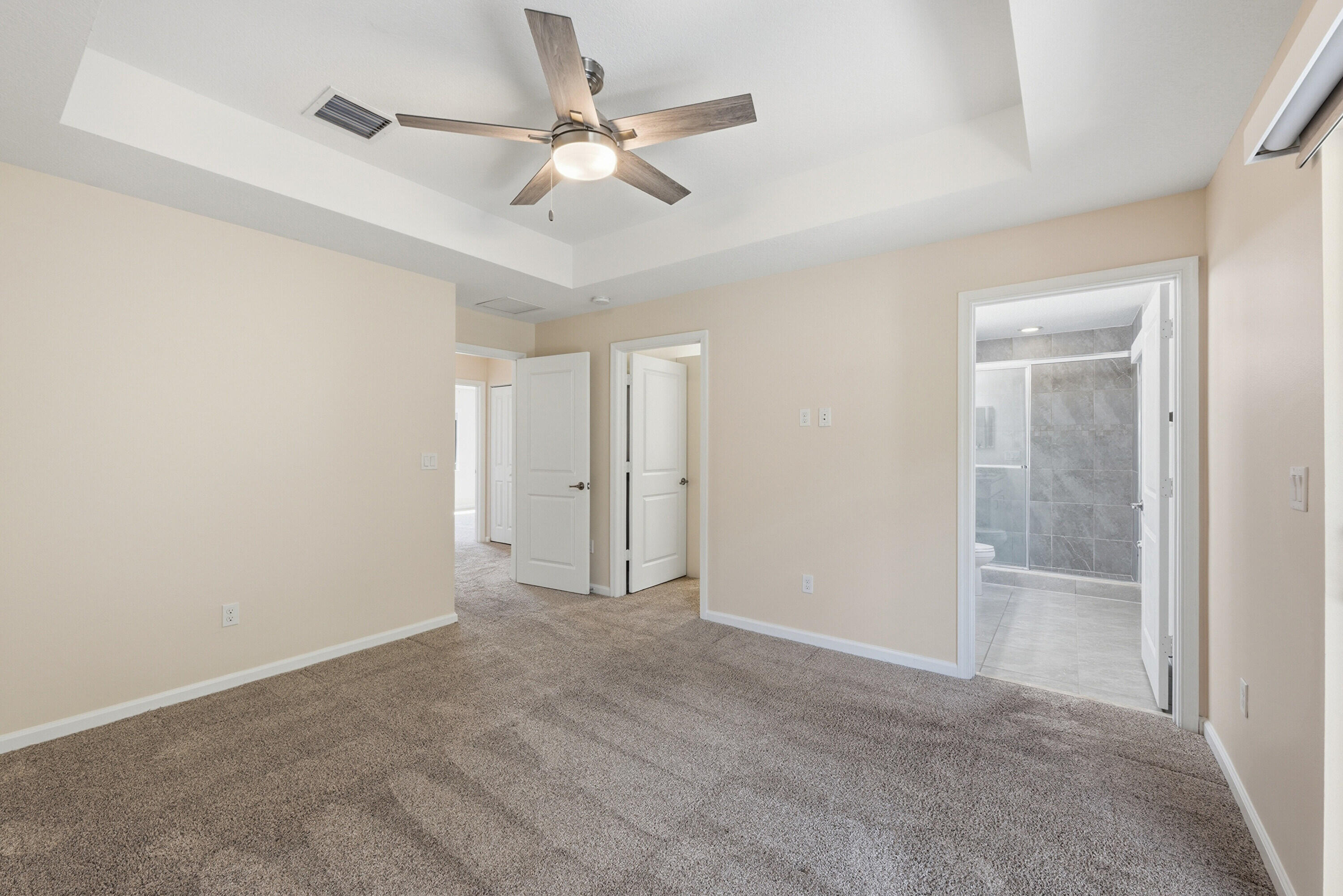 340 Northwest 33rd Lane Pompano Beach, FL 33069 - Photo 19 of 47 a view of an empty room and a ceiling fan