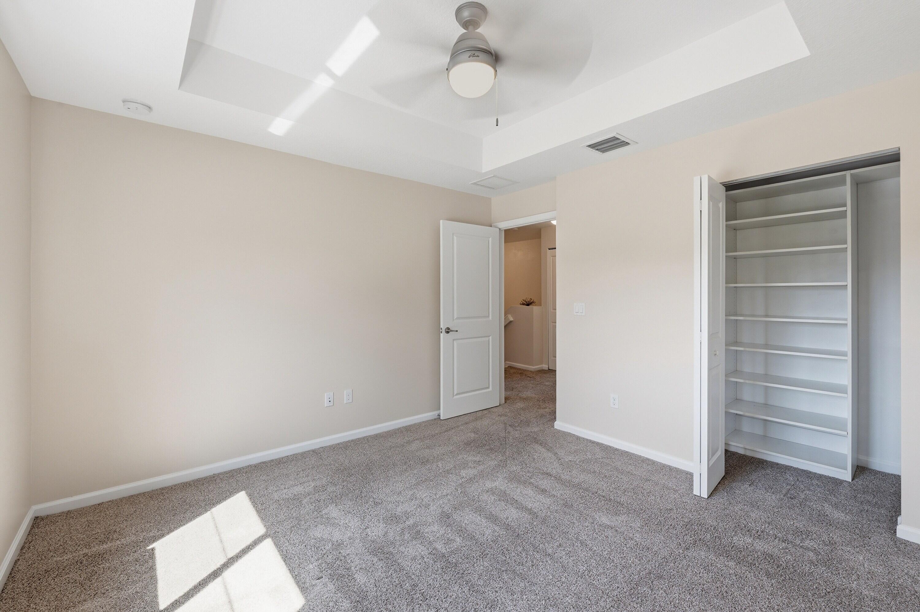 340 Northwest 33rd Lane Pompano Beach, FL 33069 - Photo 29 of 47 a view of an empty room and a ceiling fan