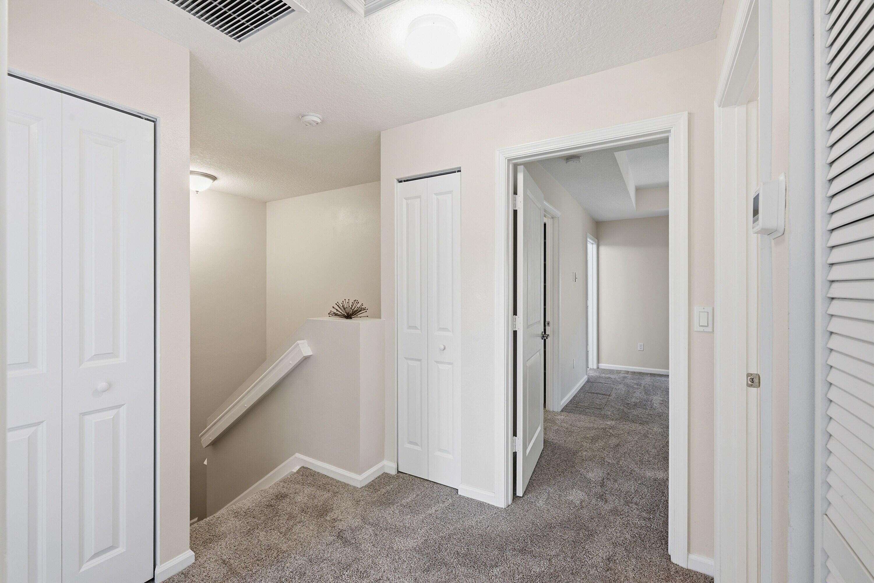 340 Northwest 33rd Lane Pompano Beach, FL 33069 - Photo 32 of 47 a view of a hallway with elevator