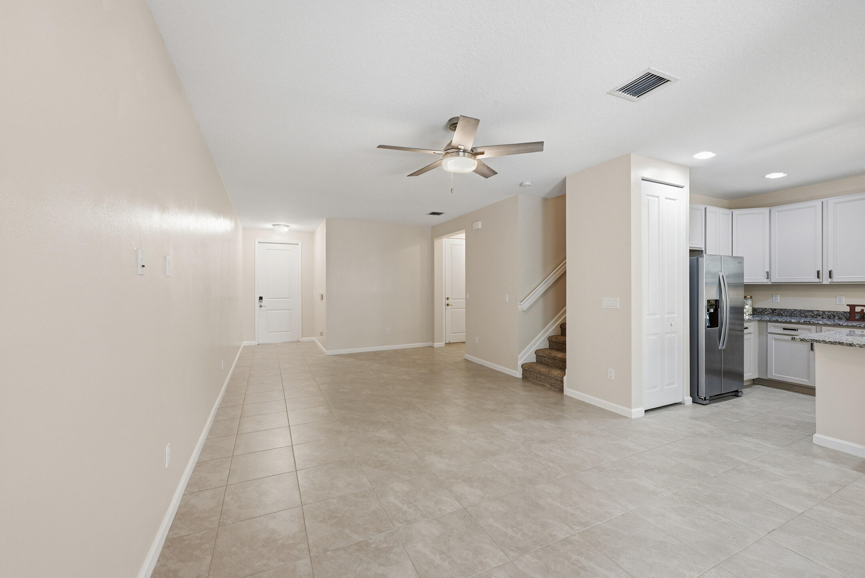 340 Northwest 33rd Lane Pompano Beach, FL 33069 - Photo 4 of 47 a view of an empty room with a window