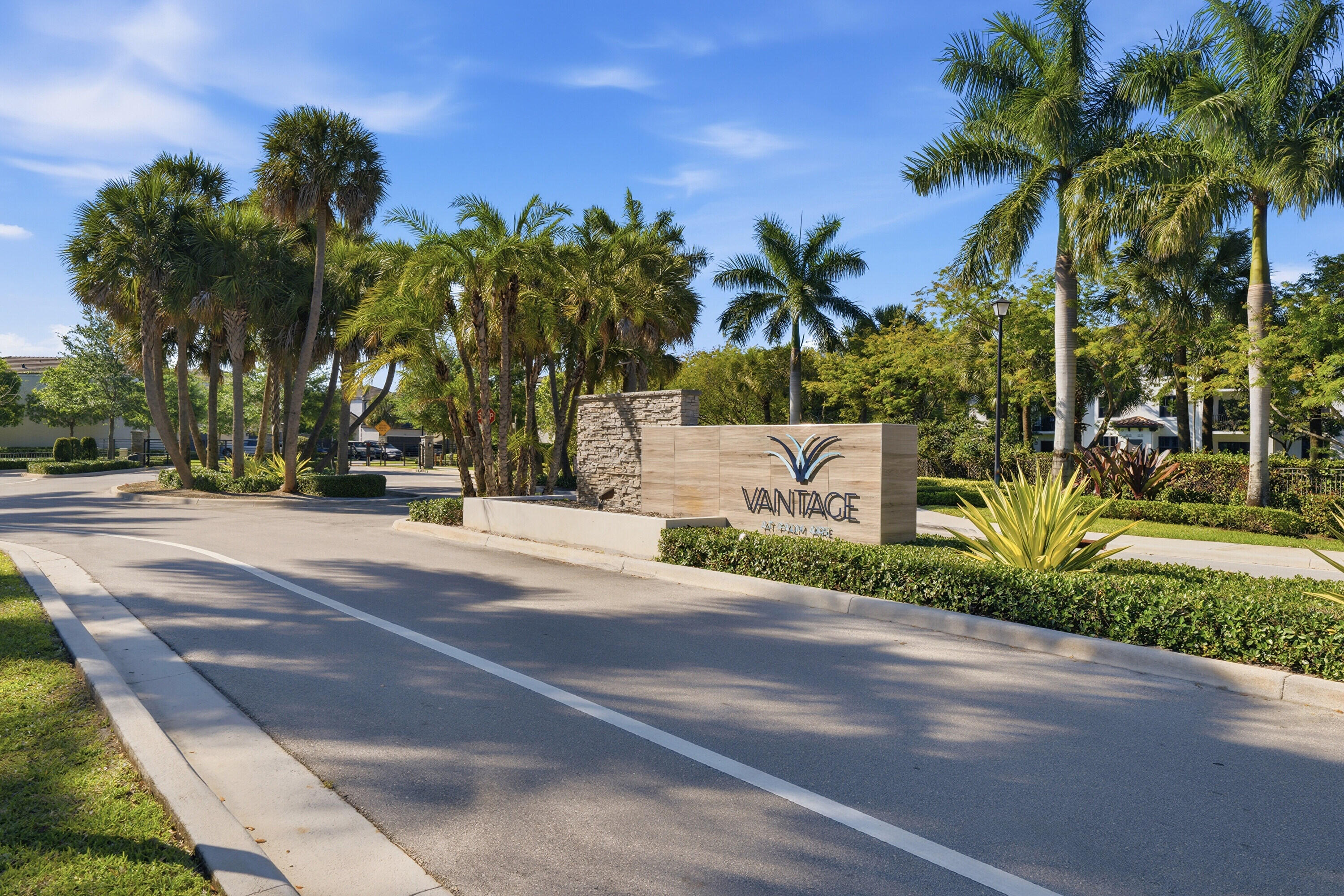 340 Northwest 33rd Lane Pompano Beach, FL 33069 - Photo 41 of 47 a view of a street with a building in front of it