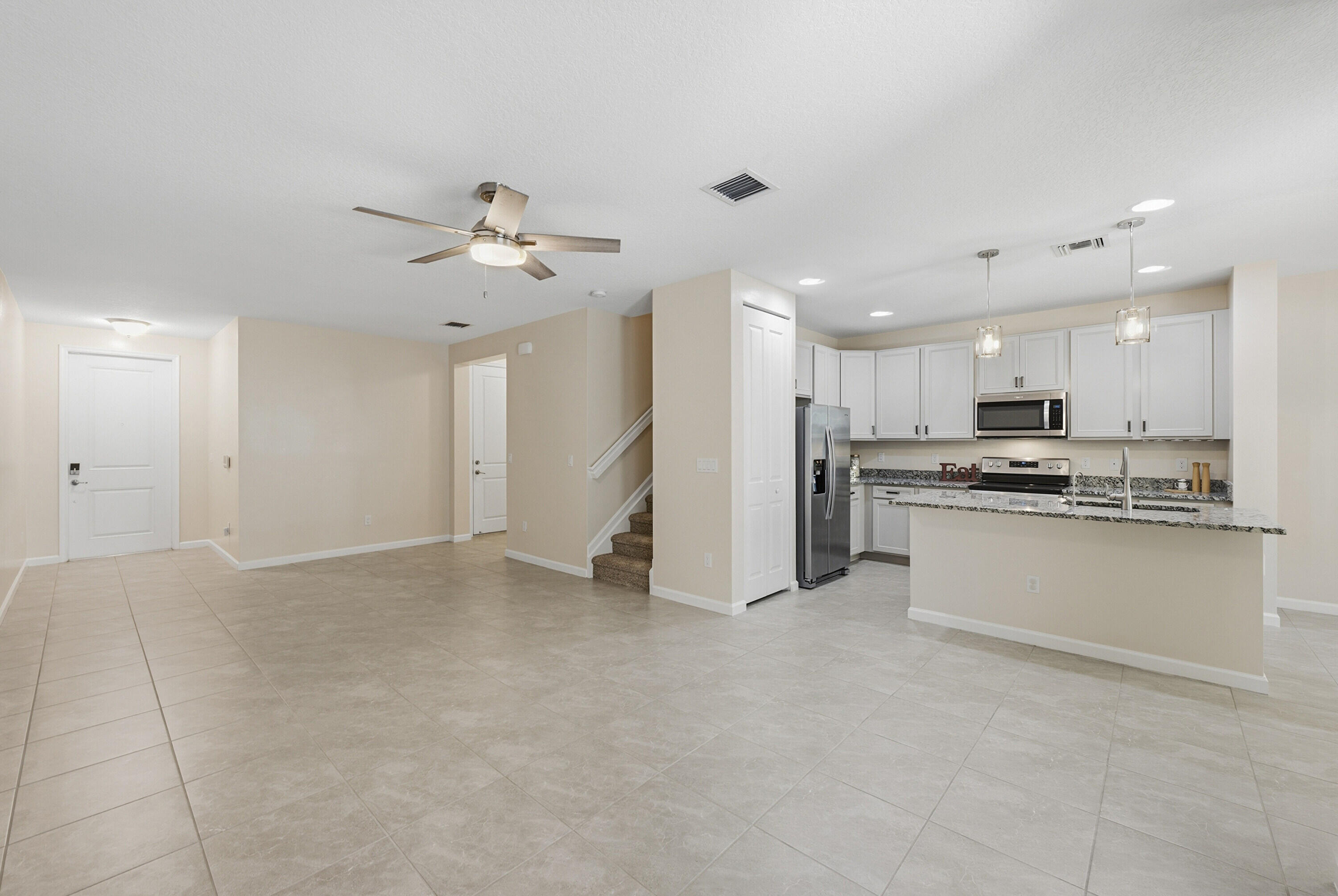 340 Northwest 33rd Lane Pompano Beach, FL 33069 - Photo 6 of 47 a view of kitchen with refrigerator stove and a sink