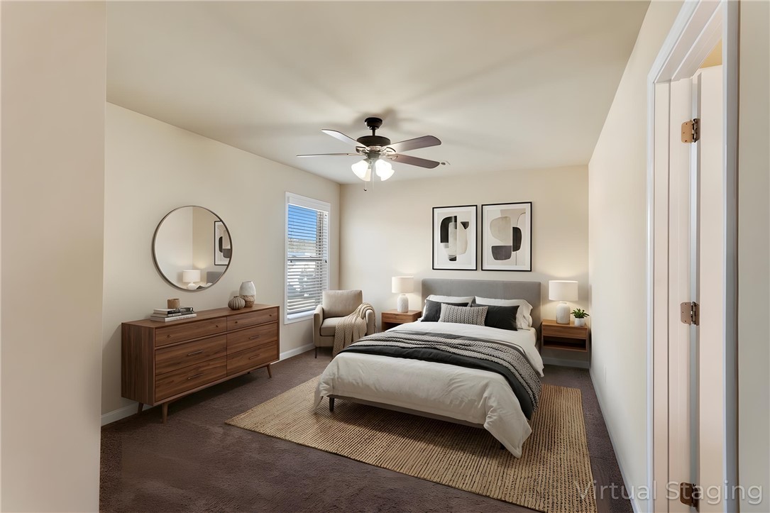 1005 Winmar Drive Anderson, SC 29621 - Photo 11 of 50 This inviting bedroom offers comfort and a tranquil atmosphere with warm lighting.