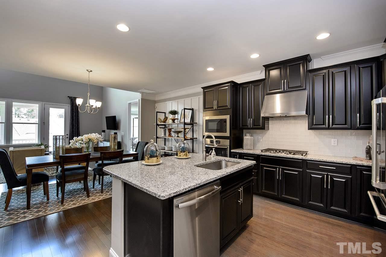2522 Rambling Creek Road, Unit 25 Apex, NC 27523 - Photo 3 of 11 Photos are of the model home.
